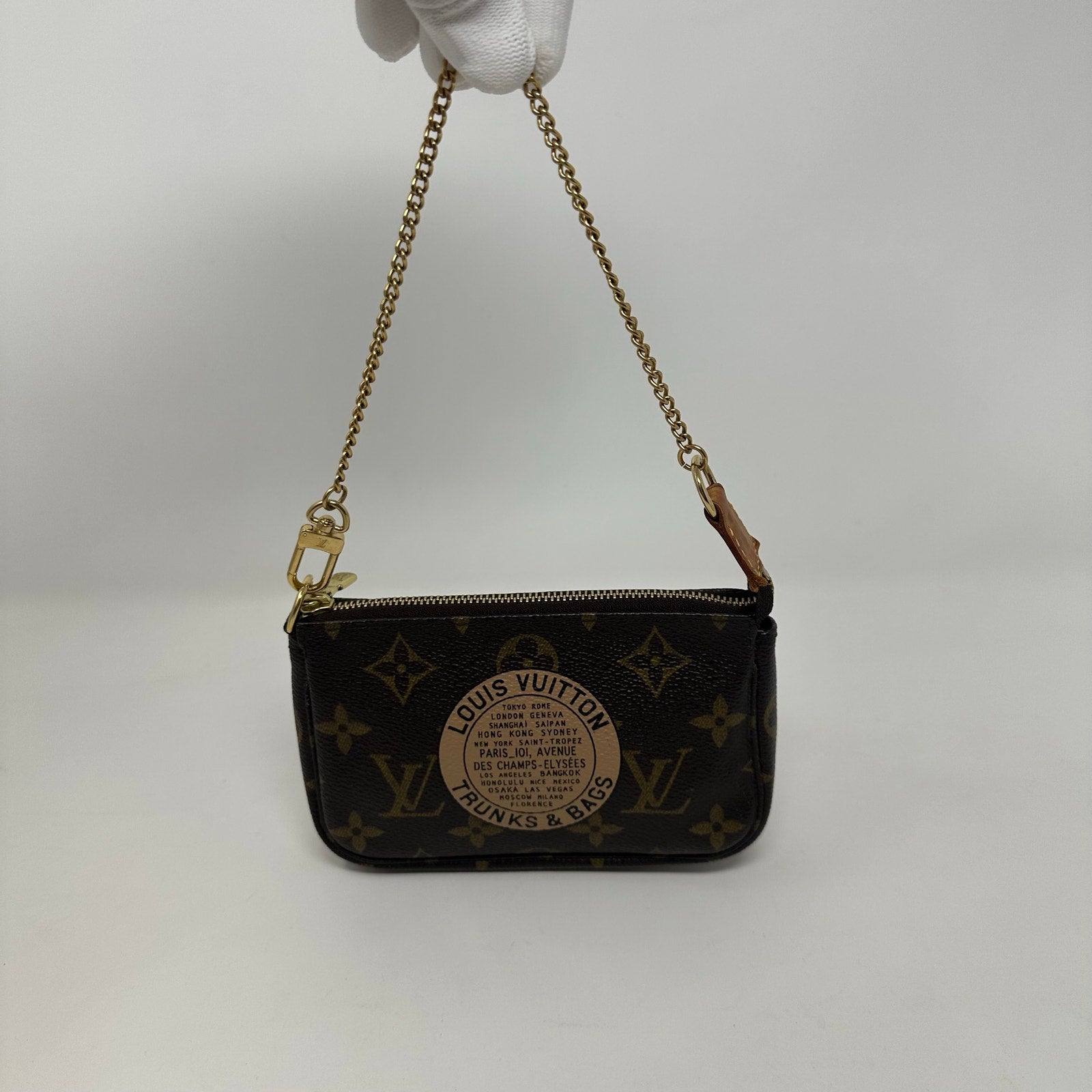 Louis Vuitton LV Limited Edition Monogram Trunks and Bags Mini Pochette