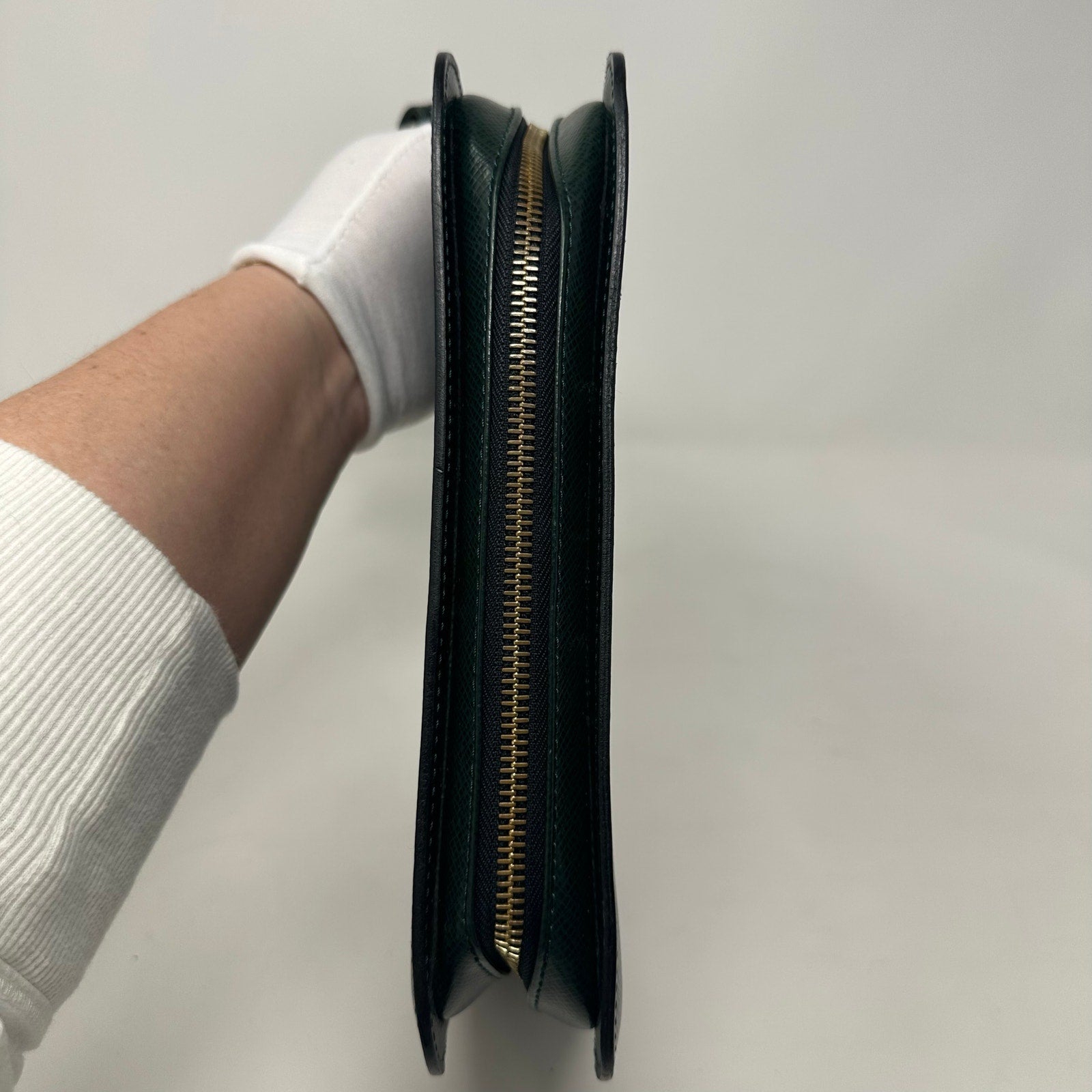 Louis Vuitton LV Baikal Clutch Epicea Green Taiga Leather Bag