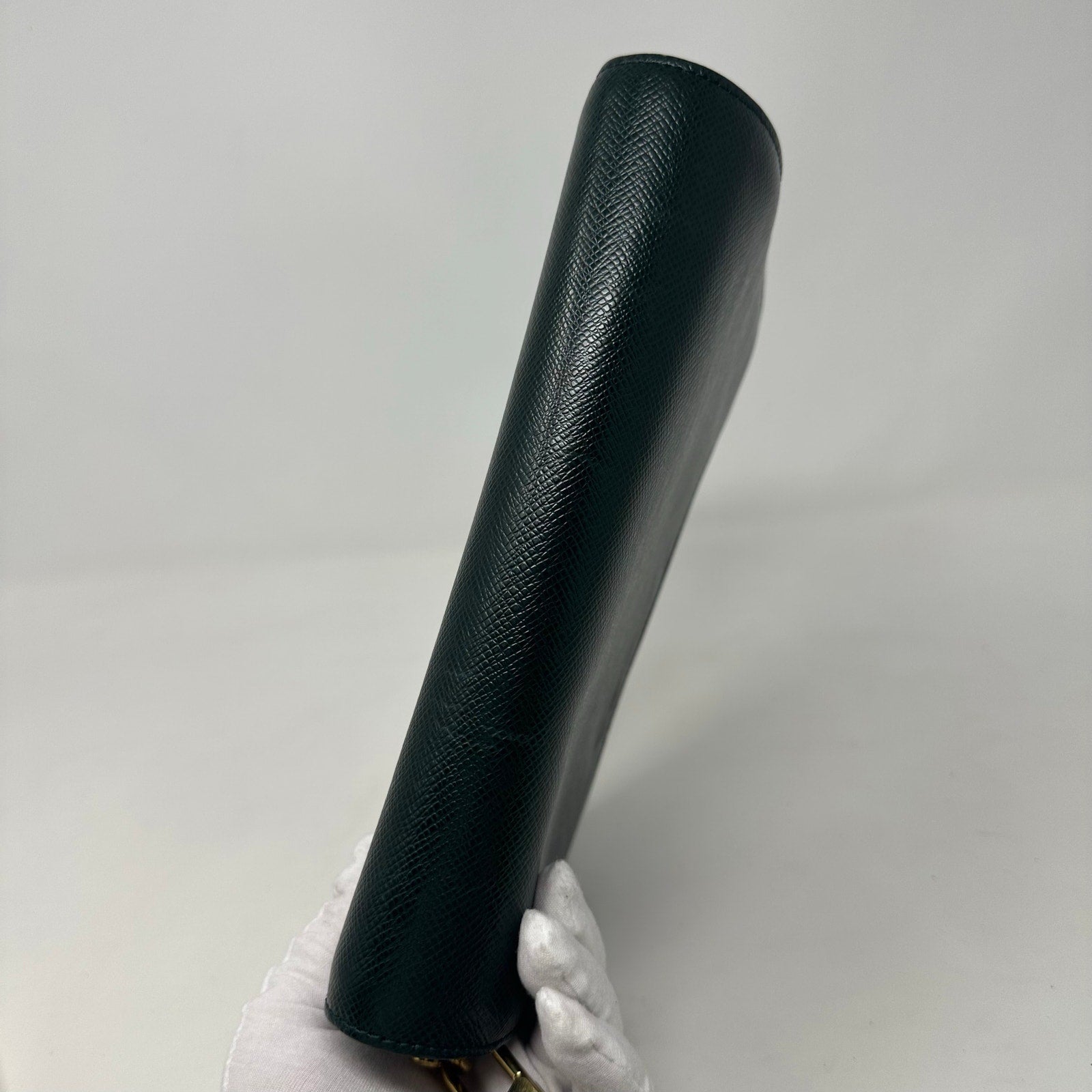 Louis Vuitton LV Baikal Clutch Epicea Green Taiga Leather Bag