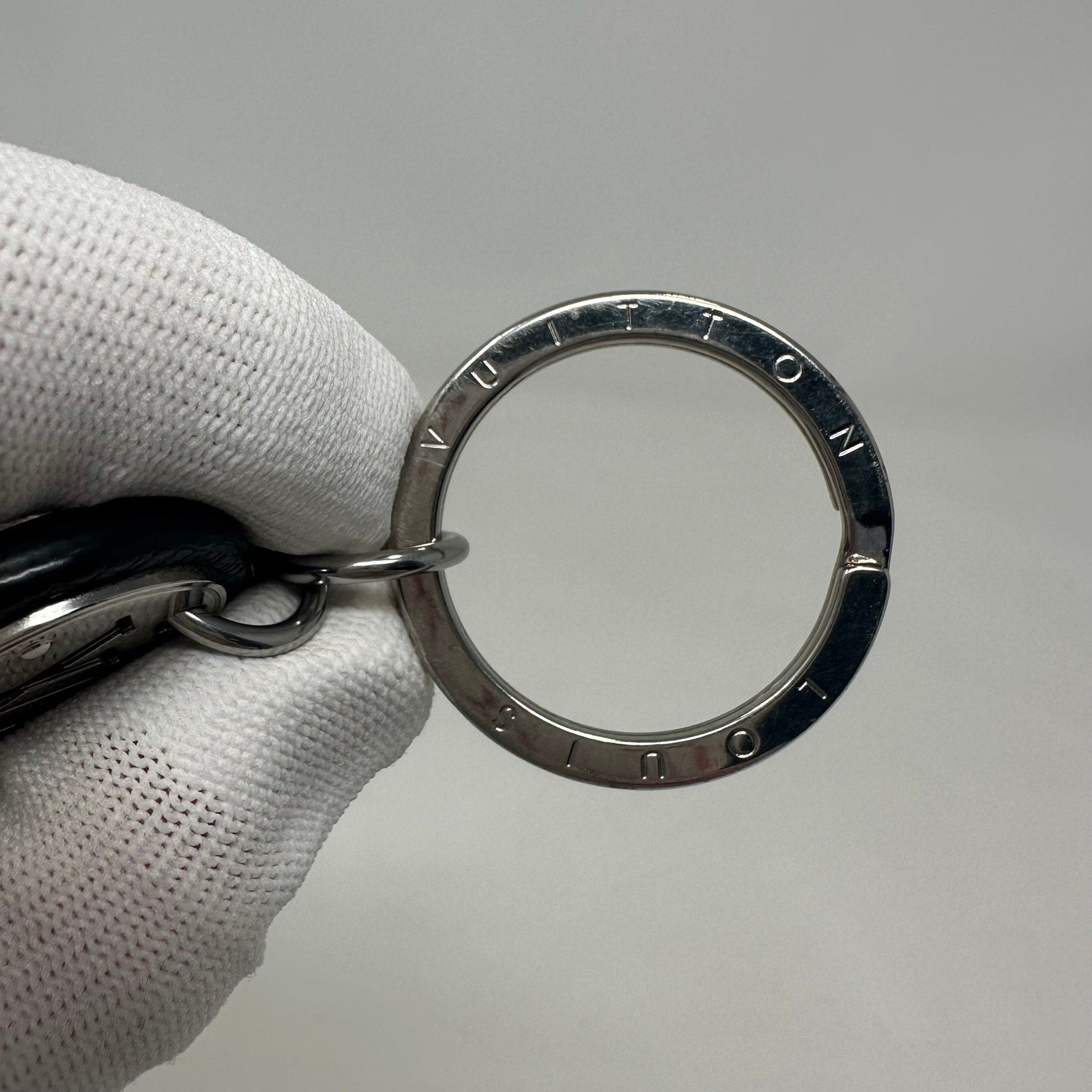 Louis Vuitton LV Cut Circle Key Ring Holder Black Silver