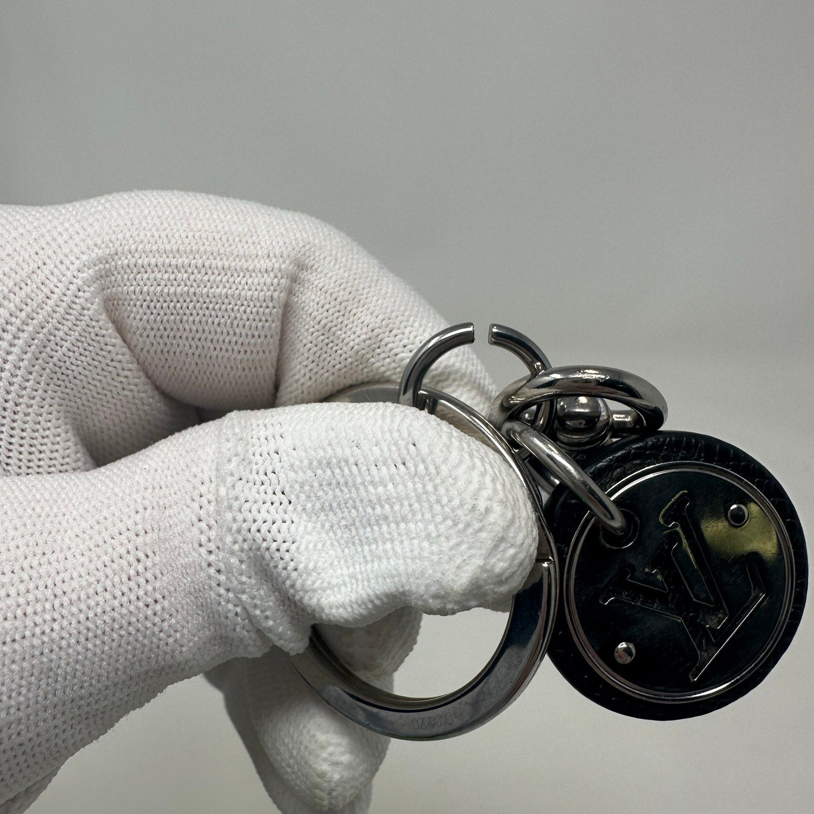 Louis Vuitton LV Cut Circle Key Ring Holder Black Silver