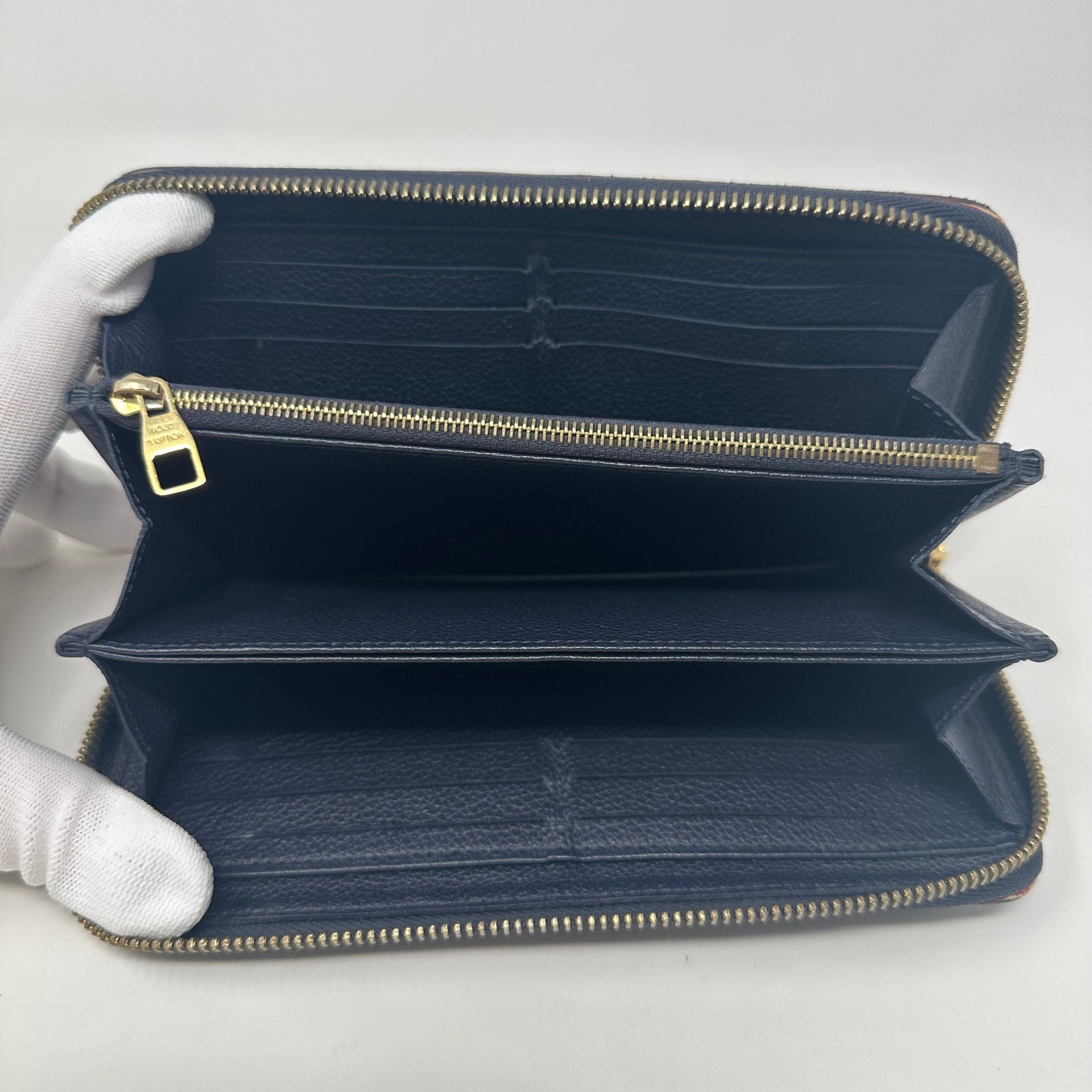 Louis Vuitton LV Zippy Vertical Round Monogram Empreinte Long Wallet Blue