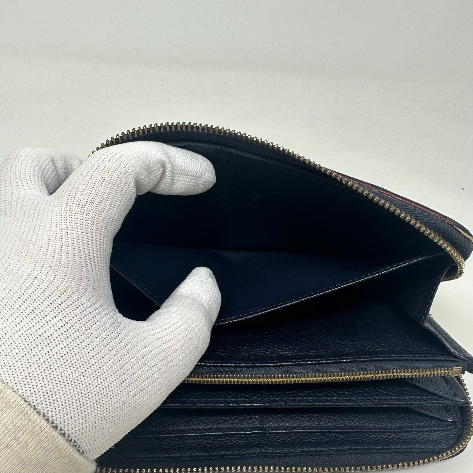 Louis Vuitton LV Zippy Vertical Round Monogram Empreinte Long Wallet Blue